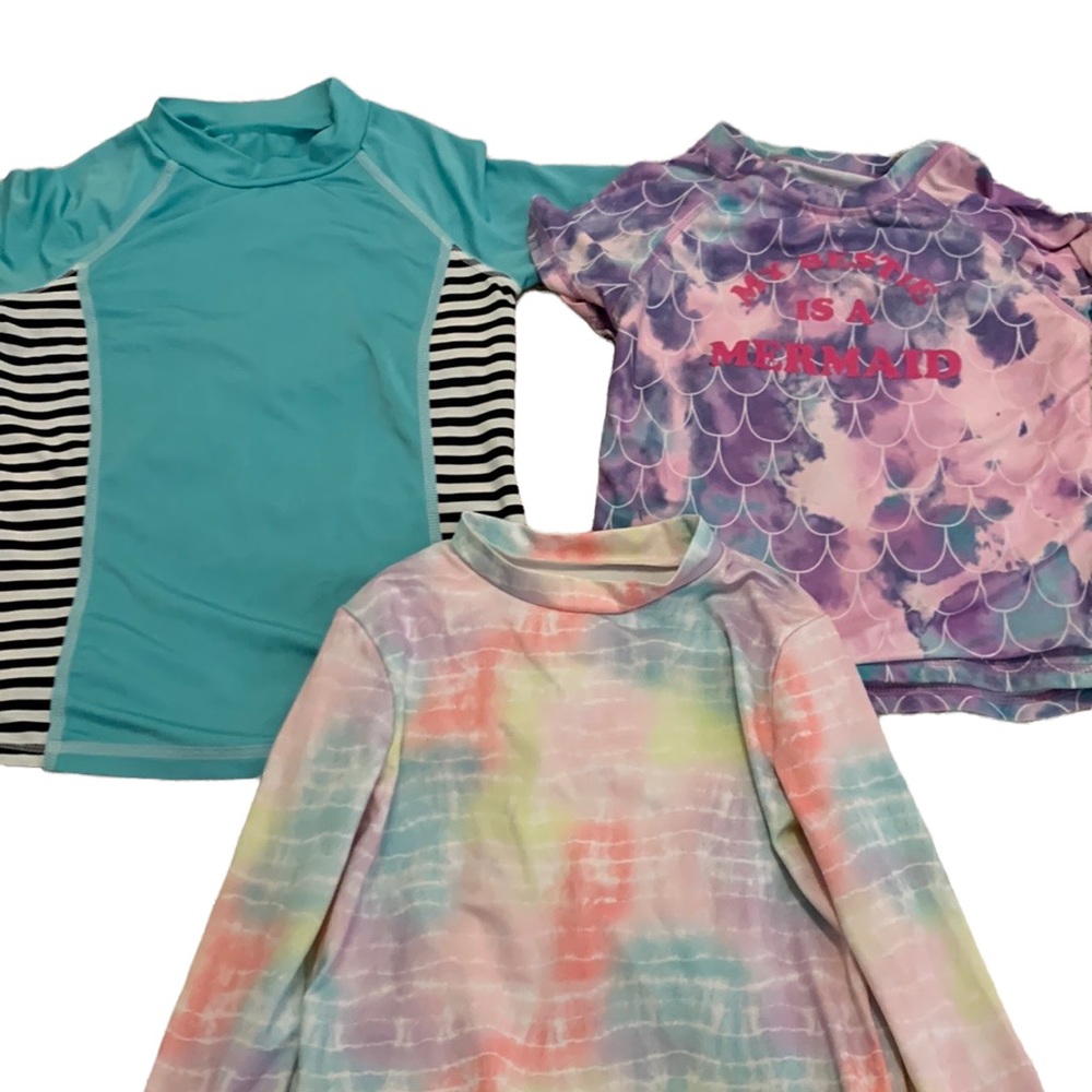 Bundle swim shirts size 6 youth